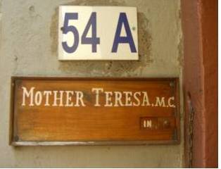 Sign next to the door of Mother House in Kolkata.  Photo courtesy of Leilani Herman.