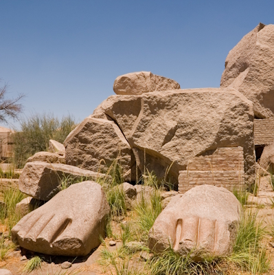 Photo of the ruins of a monumental statue of Ramses II